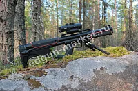 EDgun Fenix на каменном выступе, сошки разложены