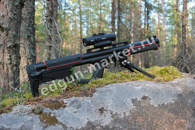 EDgun Fenix на каменном выступе, сошки разложены