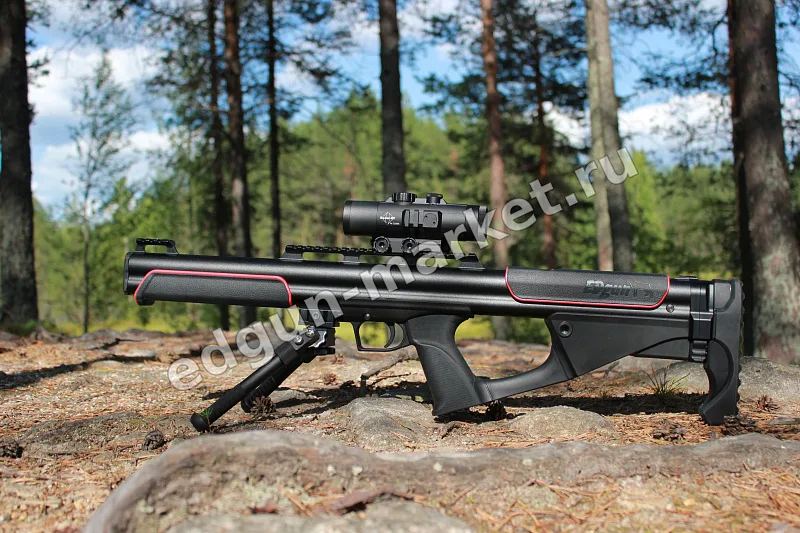 EDgun Fenix 6.35 мм 500 мм на валуне среди сосен, вид справа